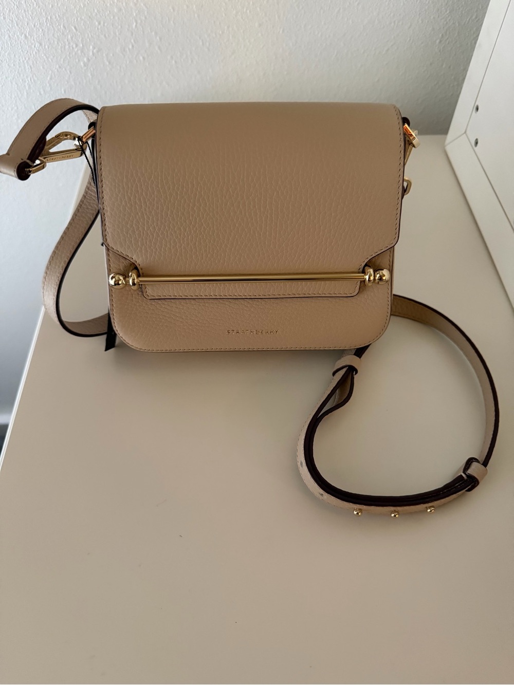 Strathberry Ace Mini Leather Crossbody Bag.